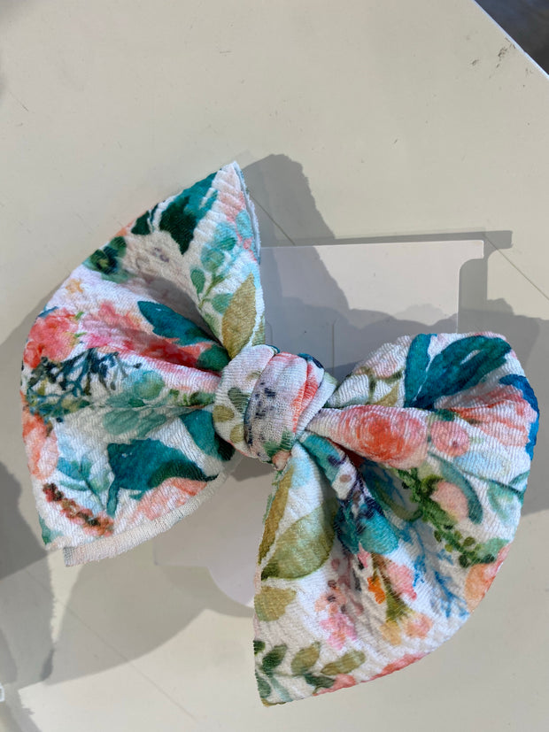 Floral with Bright greenery Bow on a Nylon headband - Wildflower Children's Boutique